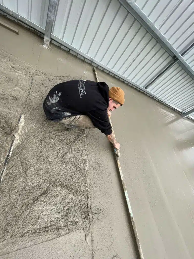 Screeding concrete